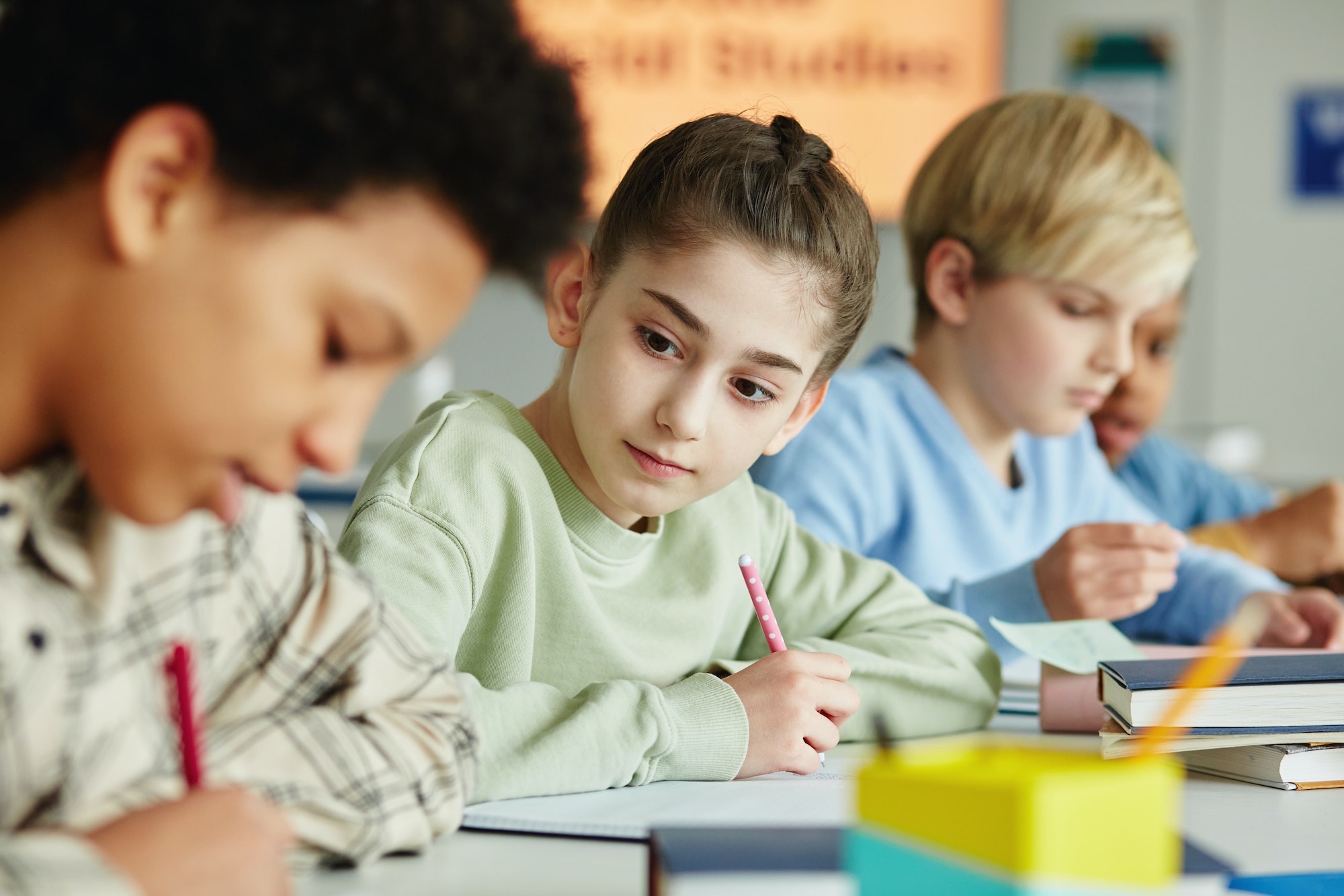 Little Girl Cheating at Test