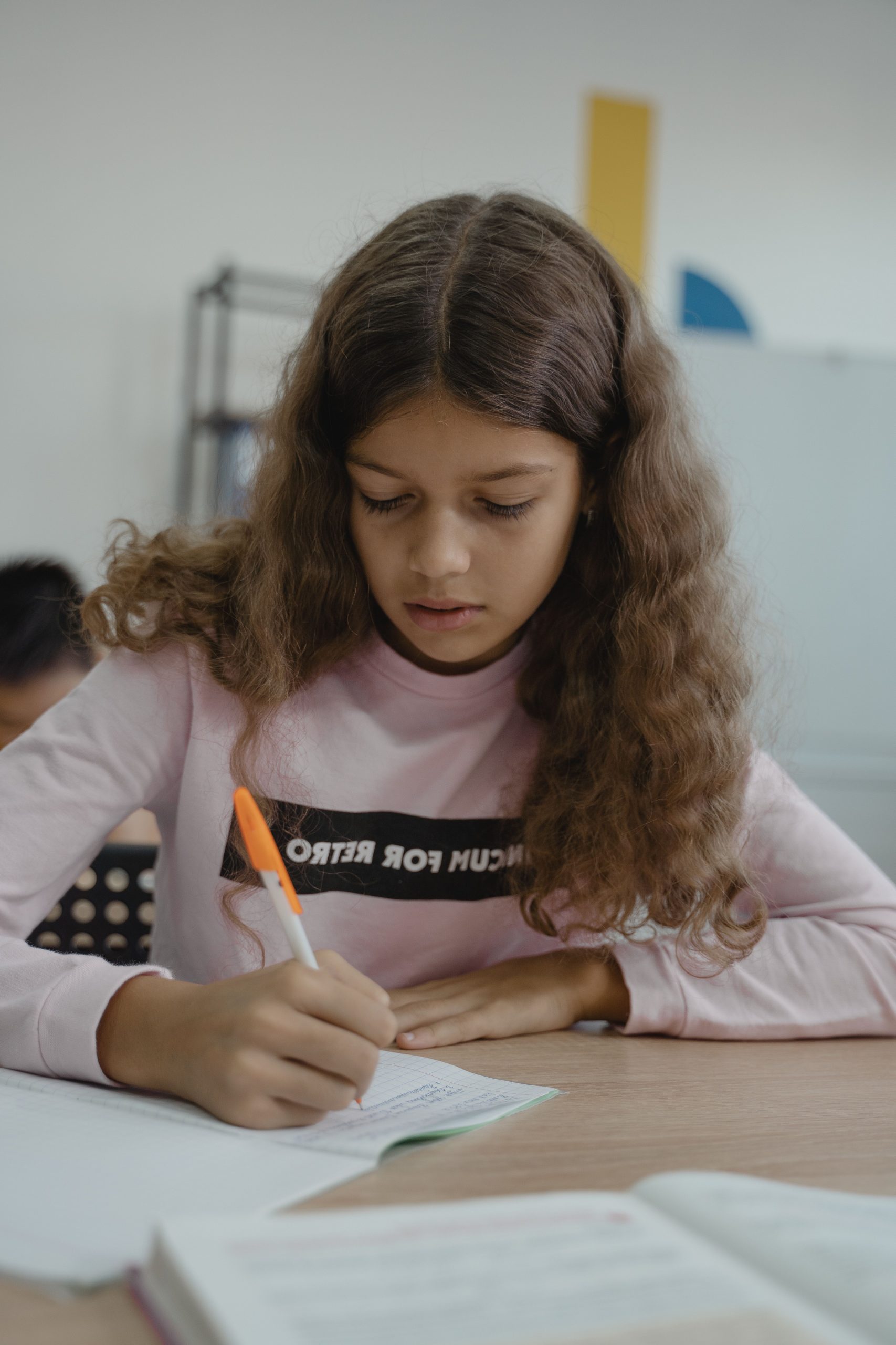 GCSE Tuition in Year 10: Why the Autumn Term is the Time to Start Geek School Tutoring Ltd Teenager writing